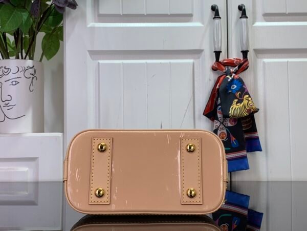 LV Alma Nano in Monogram Dune