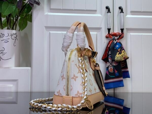 LV Alma Nano in Monogram Dune