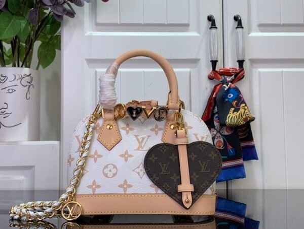 LV Alma Nano in Monogram Dune